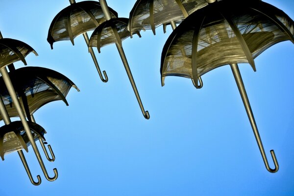 Umbrellas flying to the sky