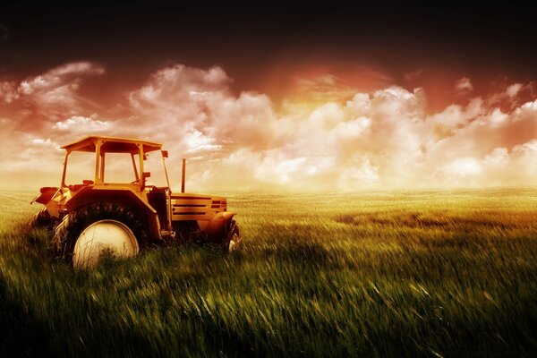 Photo of a tractor in a field against a cloudy sky at sunset