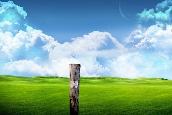 A pillar with an inscription on the background of a green meadow and clouds