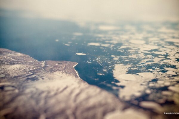 A WINTER SHOT OF THE COAST FROM AN AIRPLANE