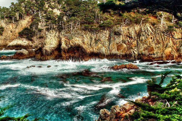 Water landscape with rocks and ocean