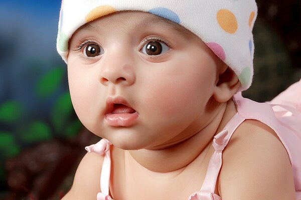 A small child in a white cap