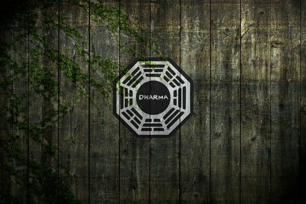 Dharma logo on wooden wall