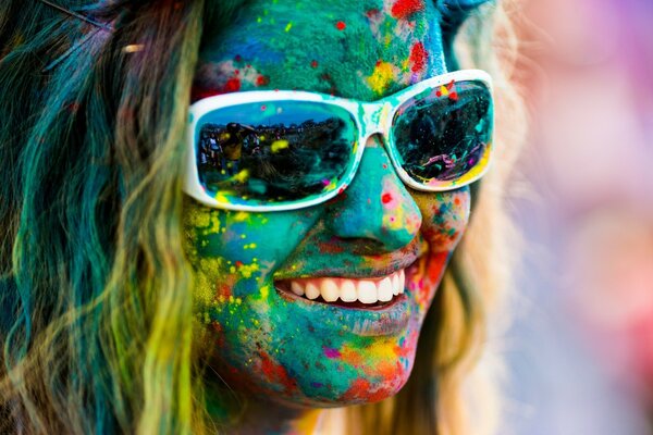 A girl in colors at the Holi Festival