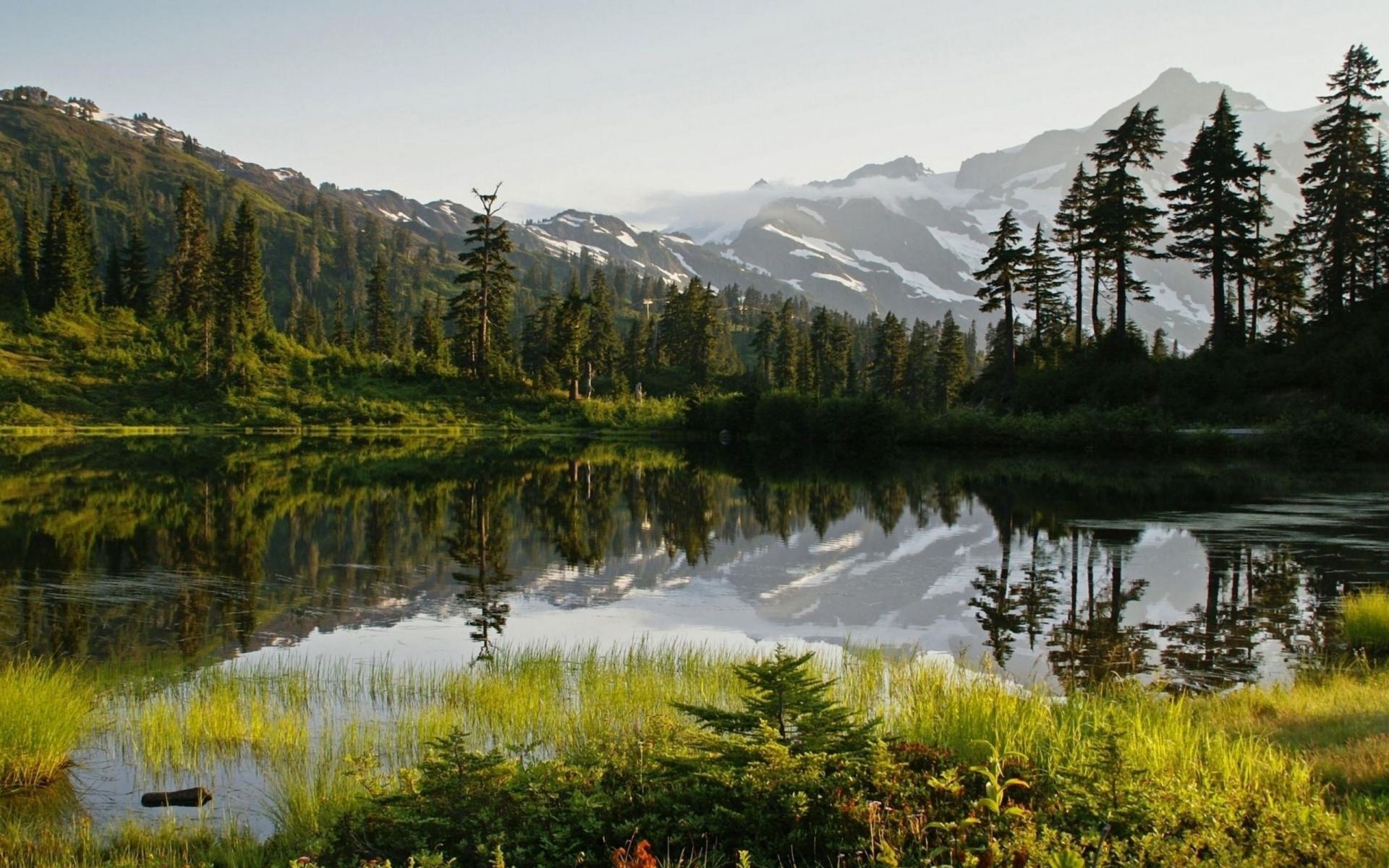 lake water reflection mountain landscape nature scenic wood outdoors snow travel tree conifer evergreen sky