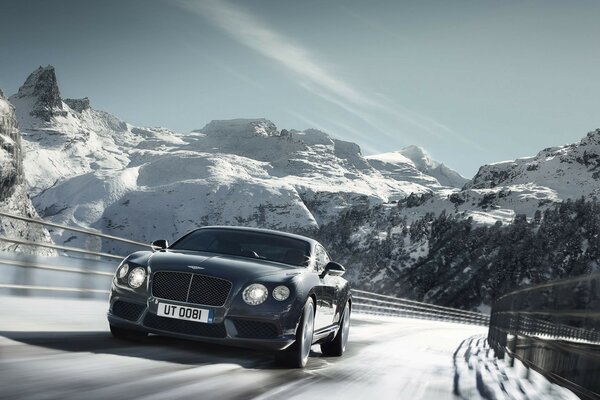 Sports car in winter mountains