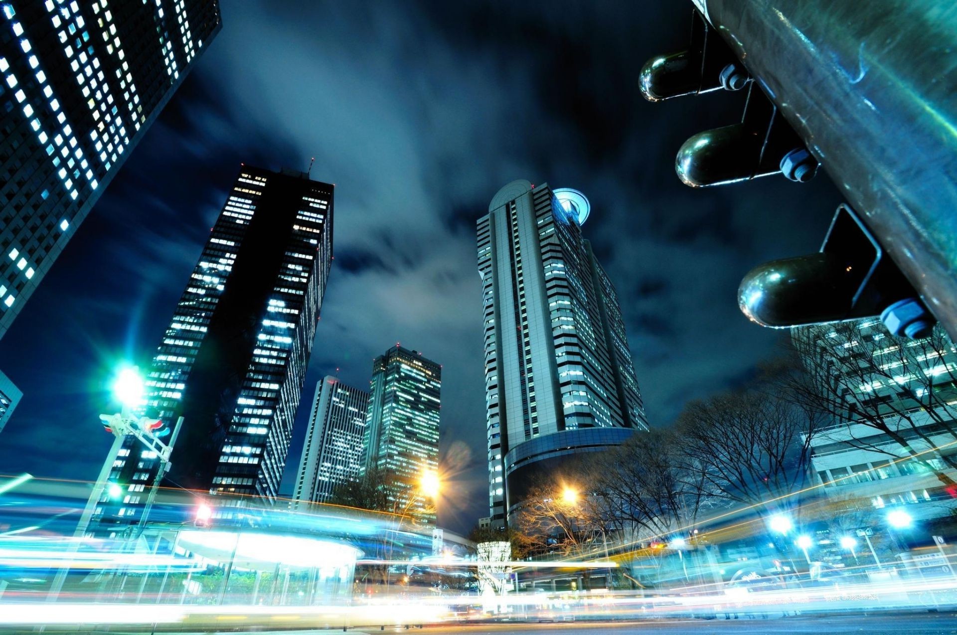 city downtown skyscraper blur building architecture urban dusk business road traffic evening bridge light street cityscape motion highway travel fast