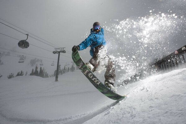 A skier rides a snowboard