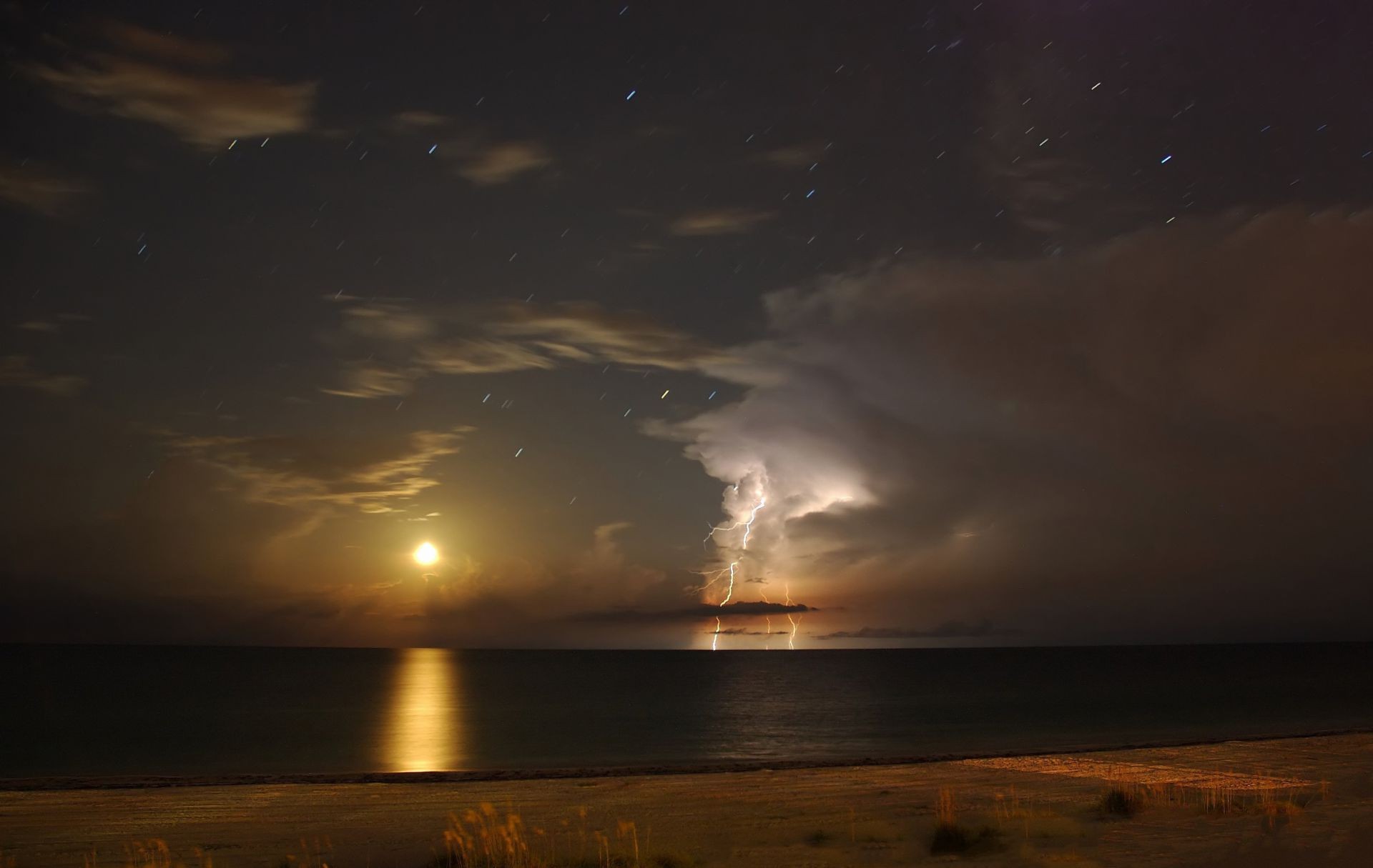 lightning sunset water beach dawn landscape sea ocean evening sun dusk reflection lake seashore sky light moon seascape storm