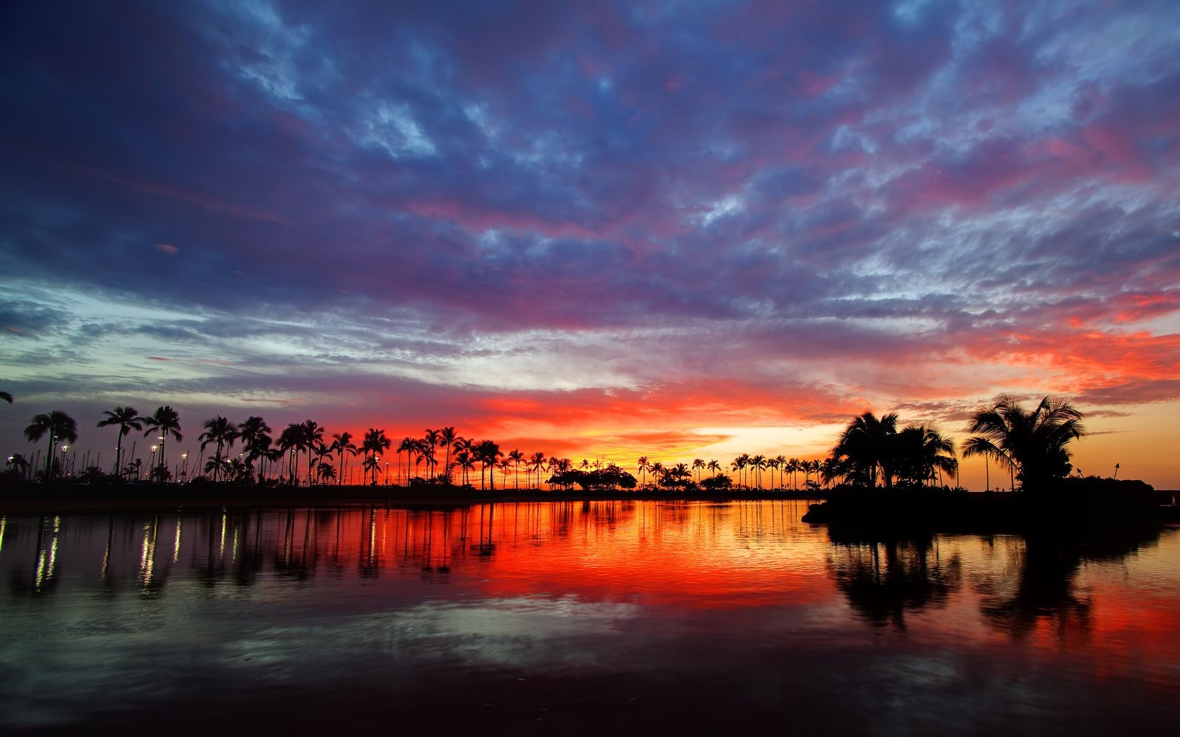 the sunset and sunrise sunset water dawn dusk reflection beach evening ocean sea sun sky seashore travel silhouette