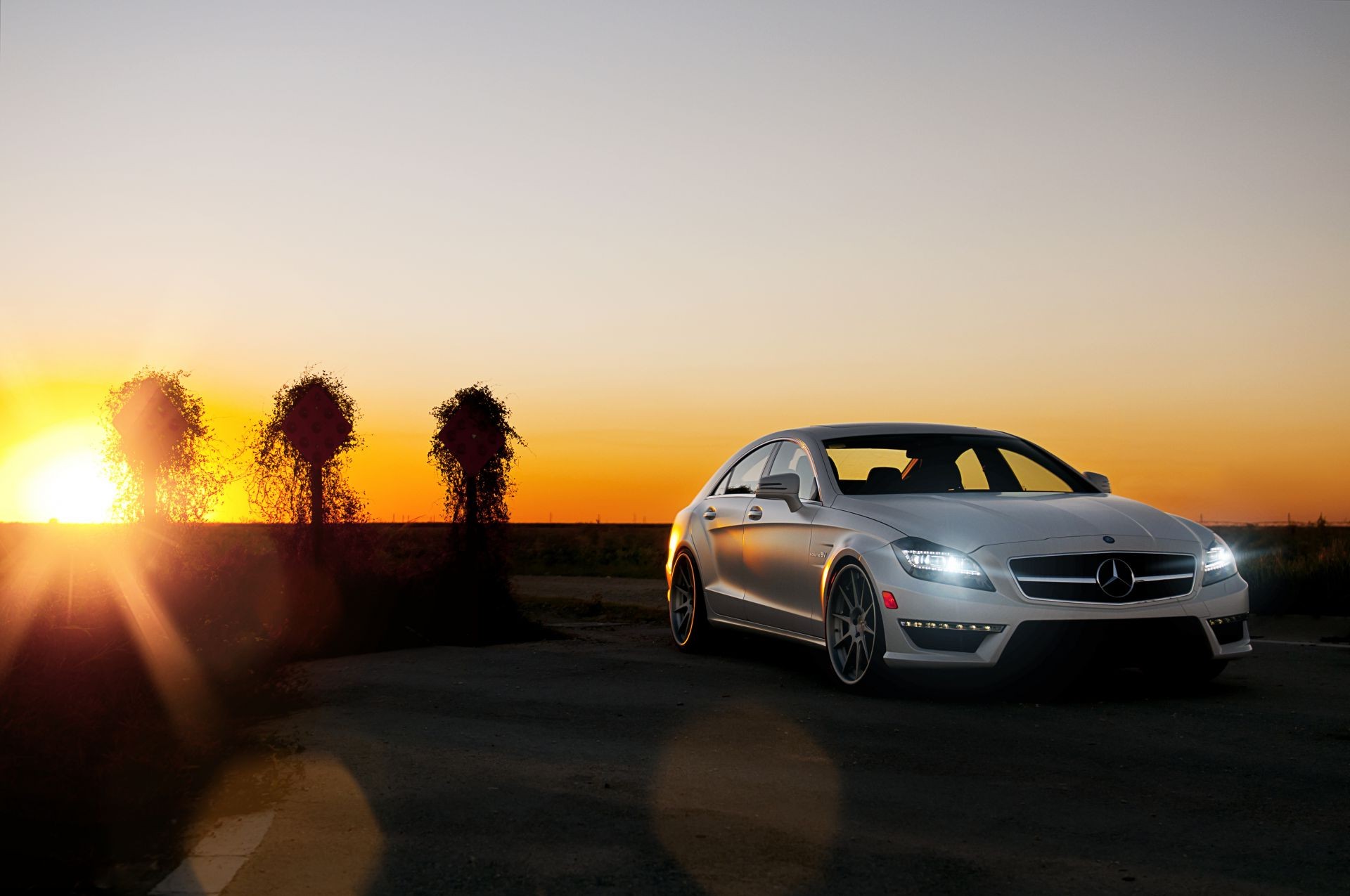 sports cars car sunset blacktop asphalt road pavement dawn vehicle blur action noon street landscape