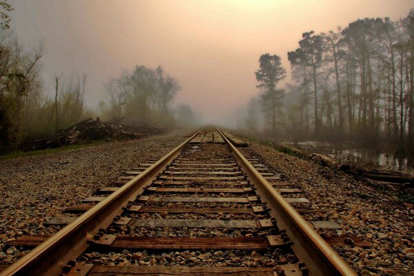 A lonely railway in the fog