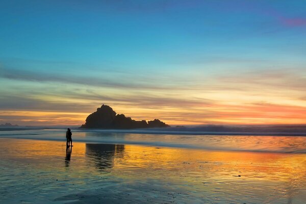 Rocas. Atardecer. Par. Amor