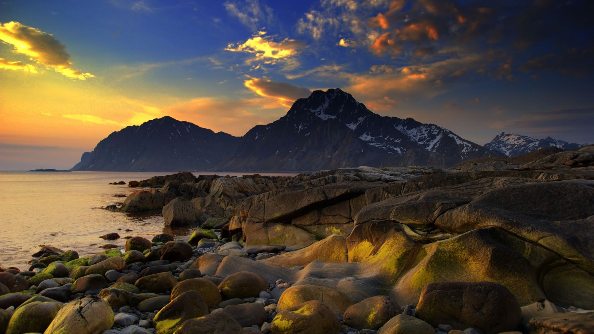 rocks boulders and stones water travel sunset mountain landscape dawn outdoors sky nature evening scenic snow rock lake