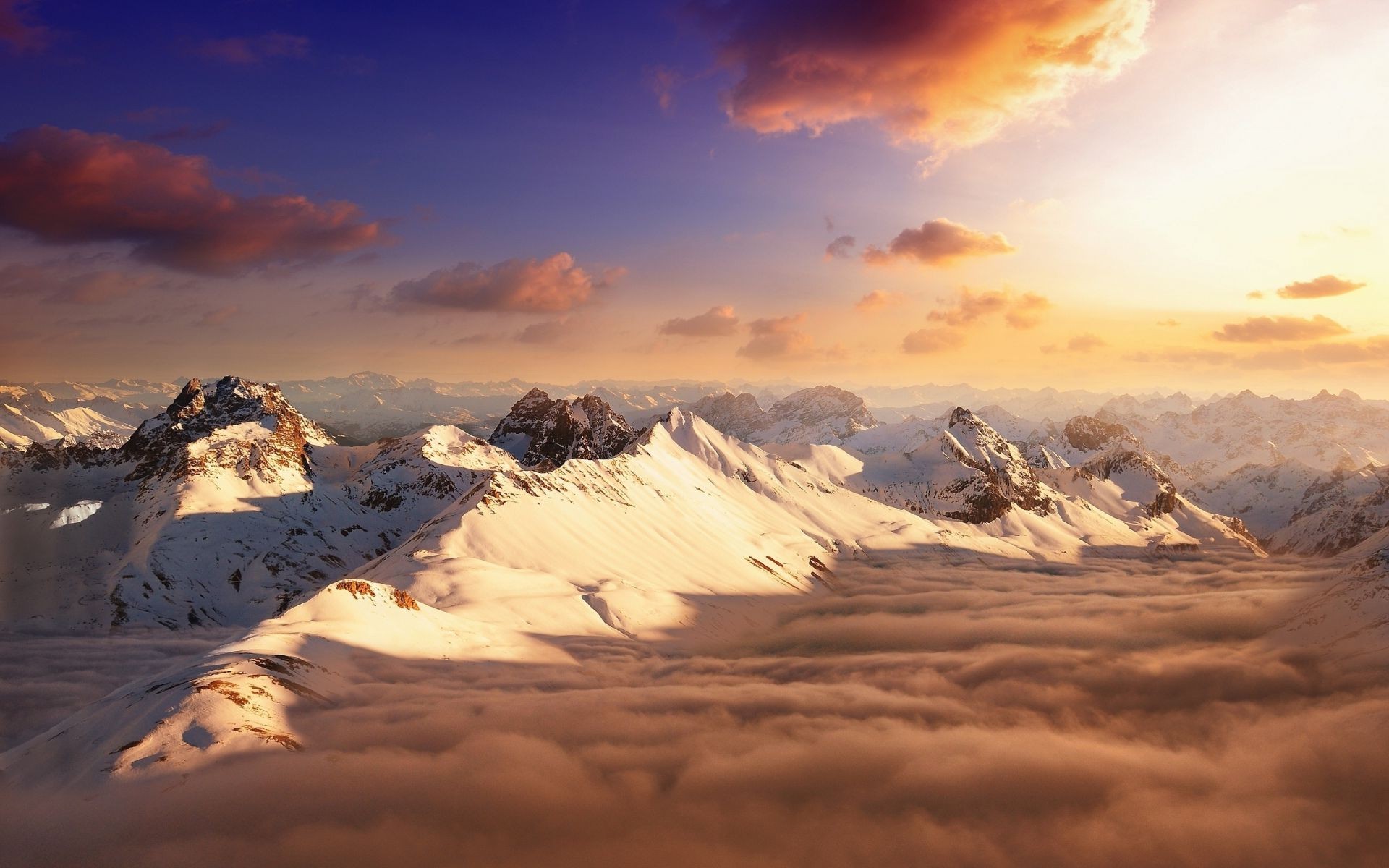 mountains snow sunset mountain landscape dawn sky winter nature fair weather ice travel light cloud sun evening