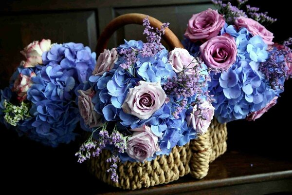 Basket with a bouquet of unusual flowers