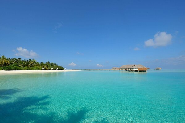 An unusual house is located near the shore