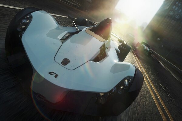 A white sports car on the road