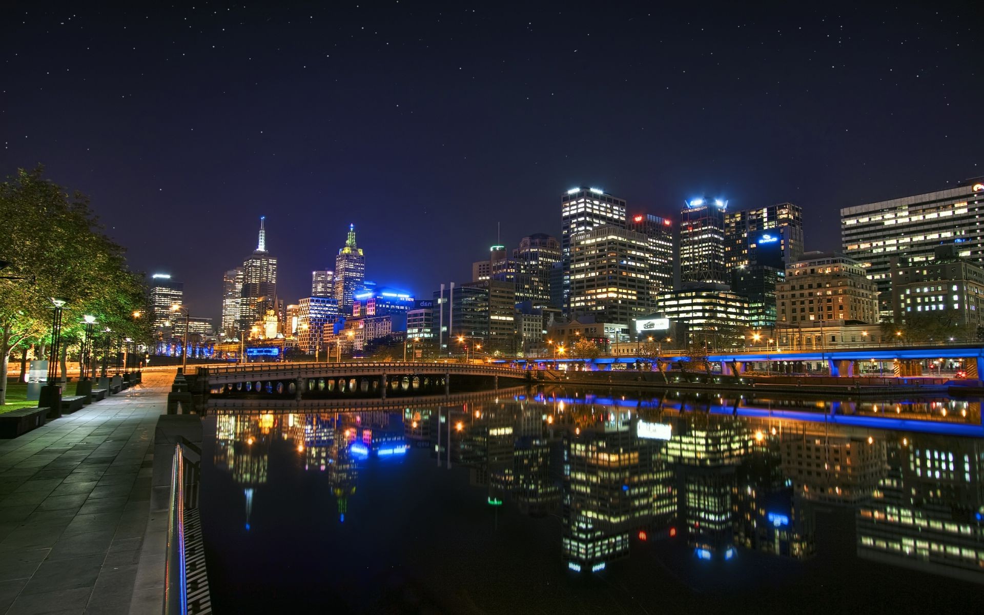 city travel dusk architecture cityscape evening building bridge sky water river illuminated skyline urban downtown traffic skyscraper modern light