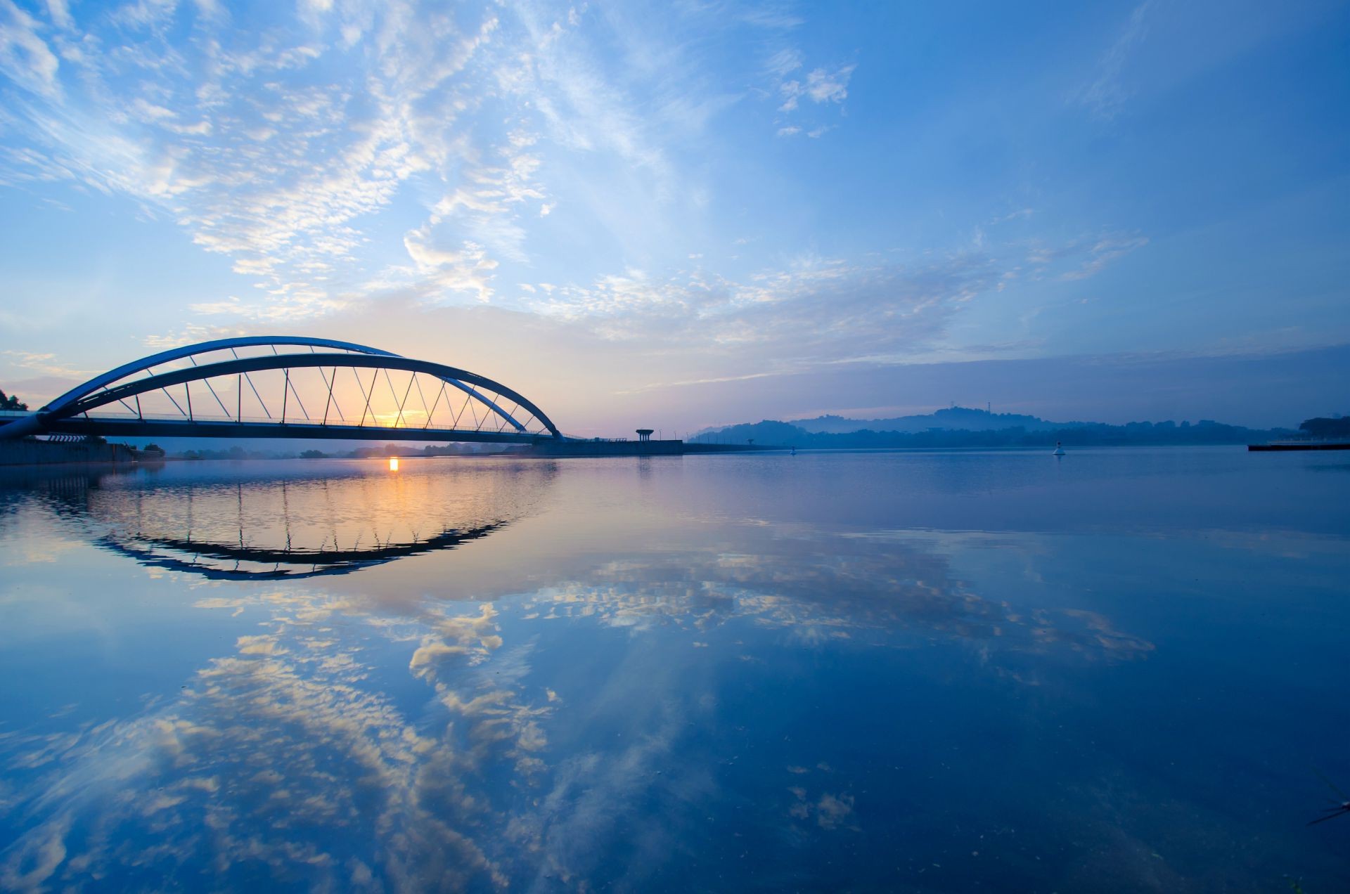 bridges water sky dawn sun nature sunset travel outdoors landscape reflection summer fair weather