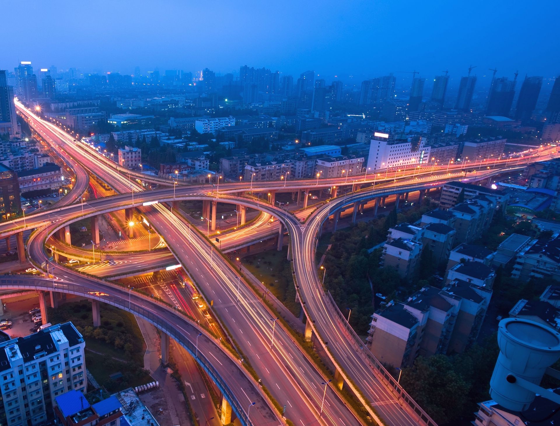 city highway traffic transportation system road bridge travel expressway blur dusk evening car motion urban connection flyover fast architecture