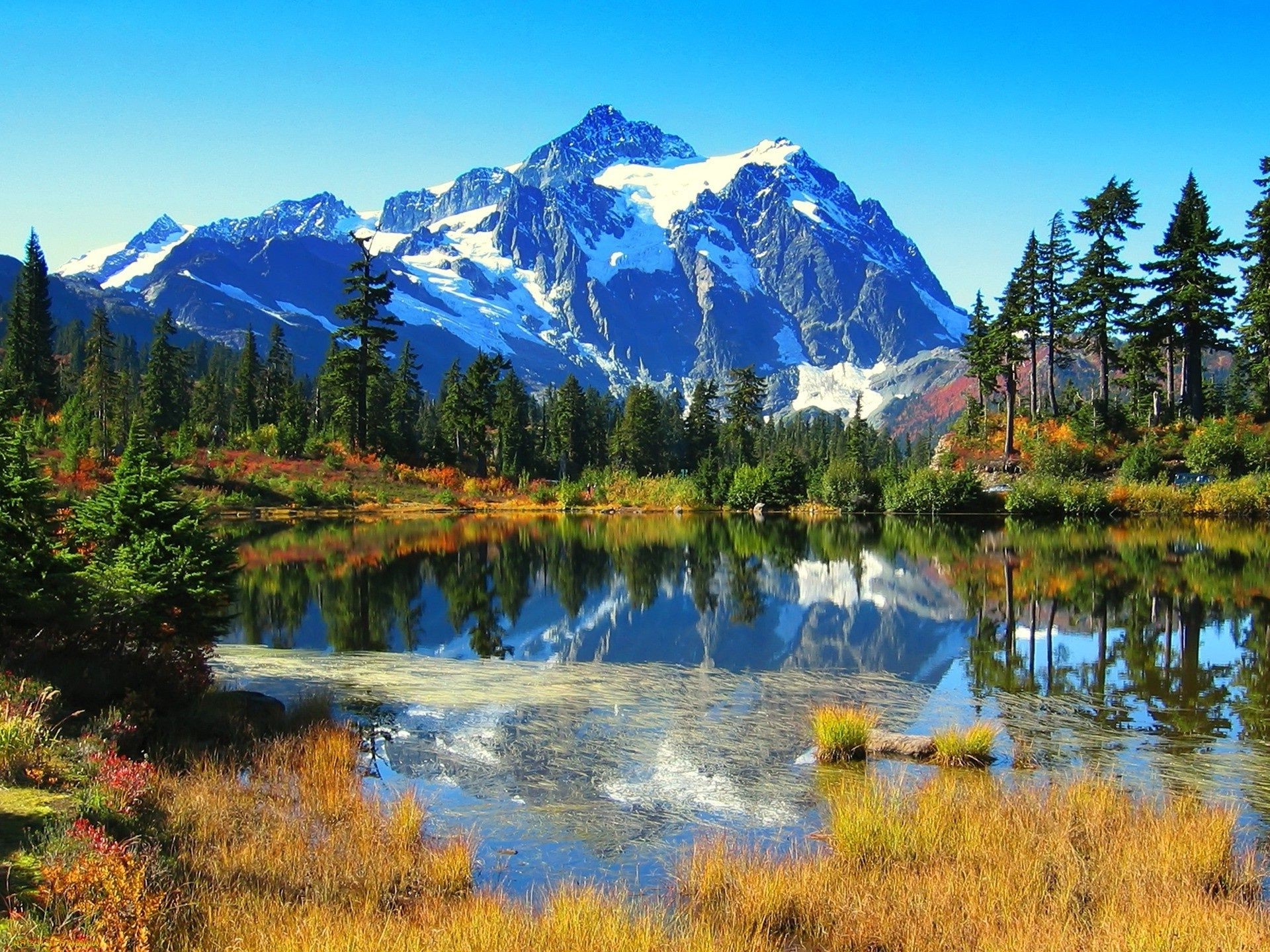 lake mountain reflection water snow scenic wood nature wild landscape outdoors travel evergreen