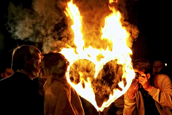 Photo shoot on the background of a burning heart