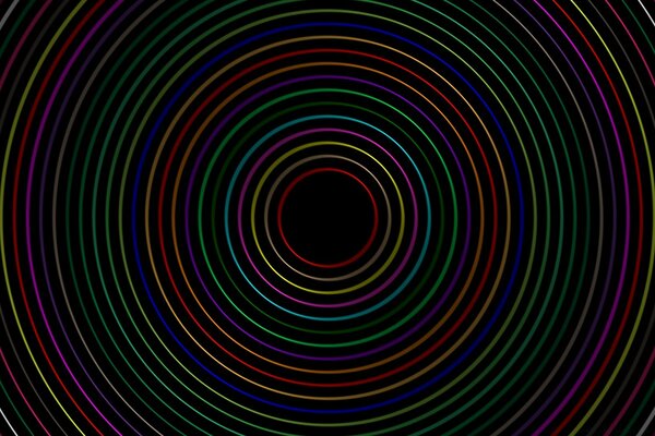 Desktop colored circles on a black background