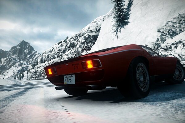 Red car on a snowy road