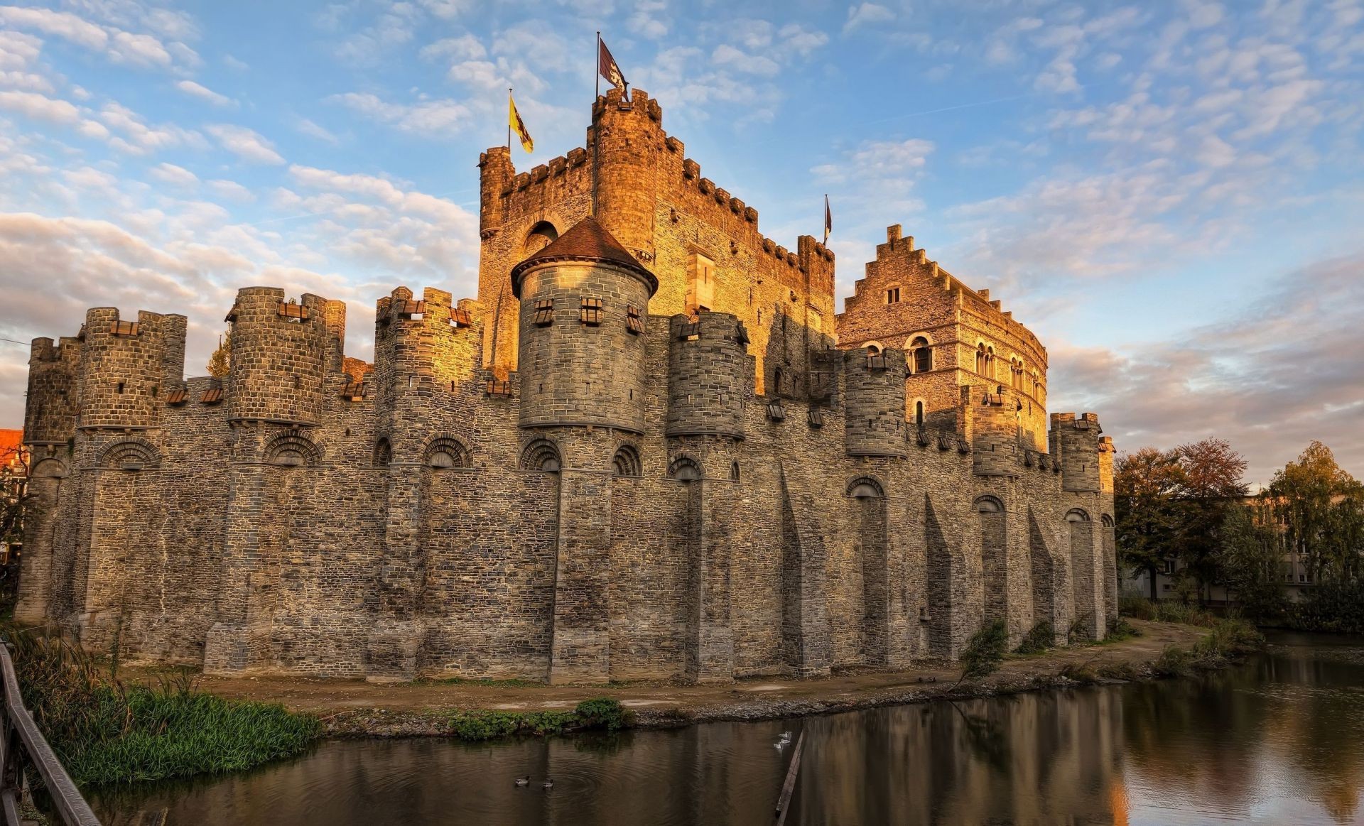 locks architecture castle travel ancient gothic old building tower fortress fortification outdoors sky river tourism stone historic landmark moat monument