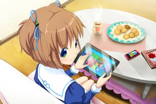 Anime girl at the table with a tablet