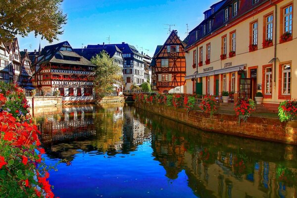 Beautiful houses stand on the river bank