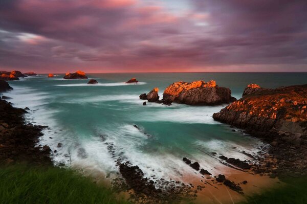 Sea sunset, sand, rocks