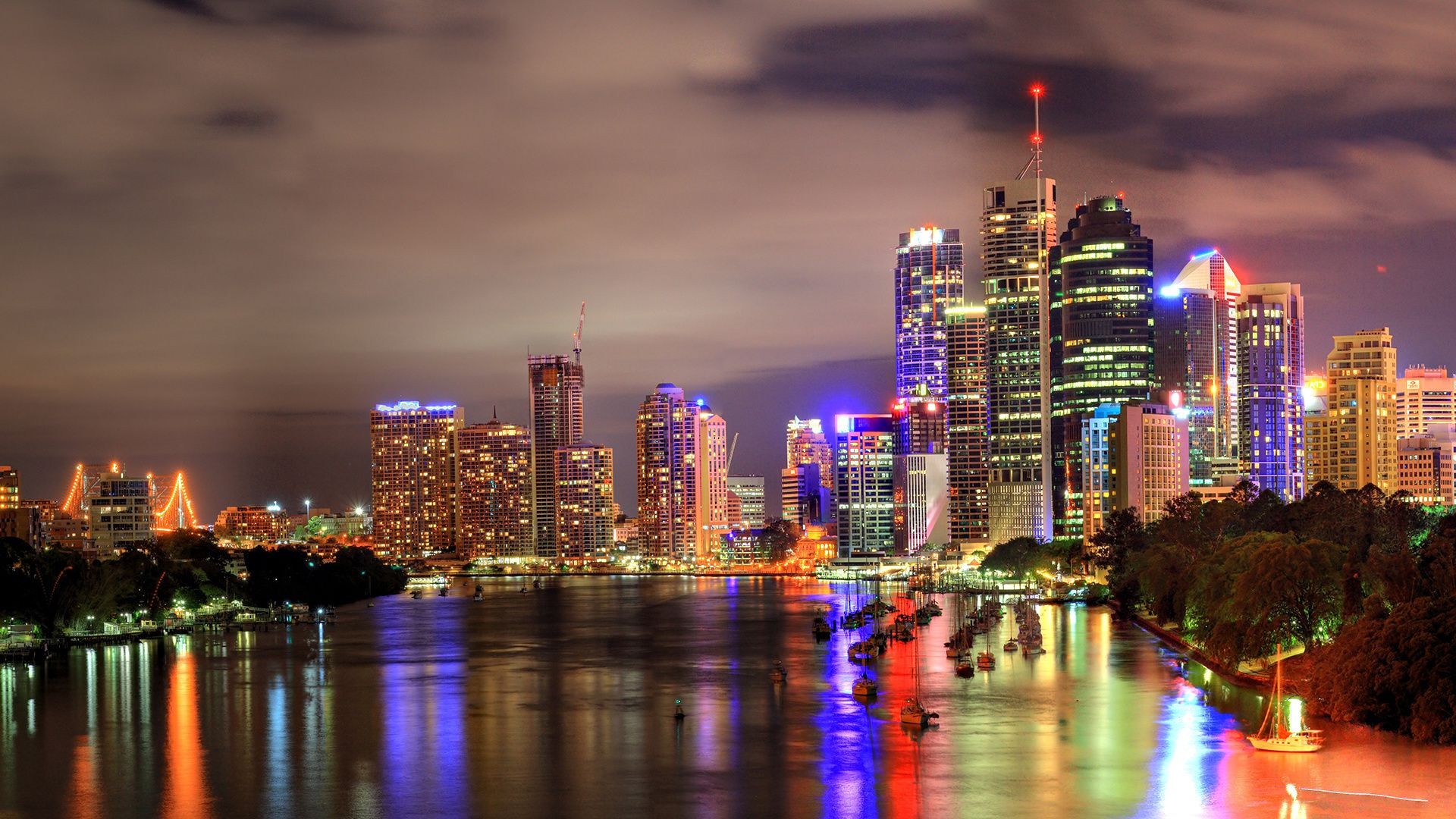 city downtown architecture cityscape dusk skyline skyscraper reflection evening water sunset river urban building bridge sky travel office illuminated business