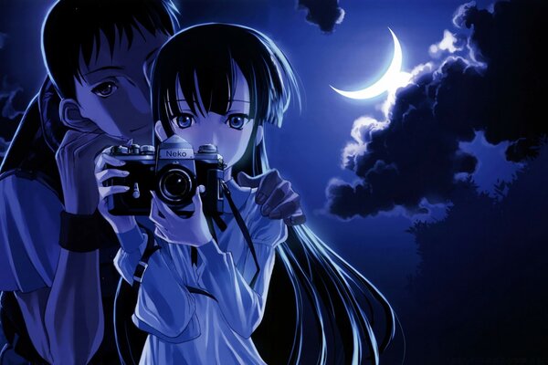 Ragazza e ragazzo con una macchina fotografica in stile anime