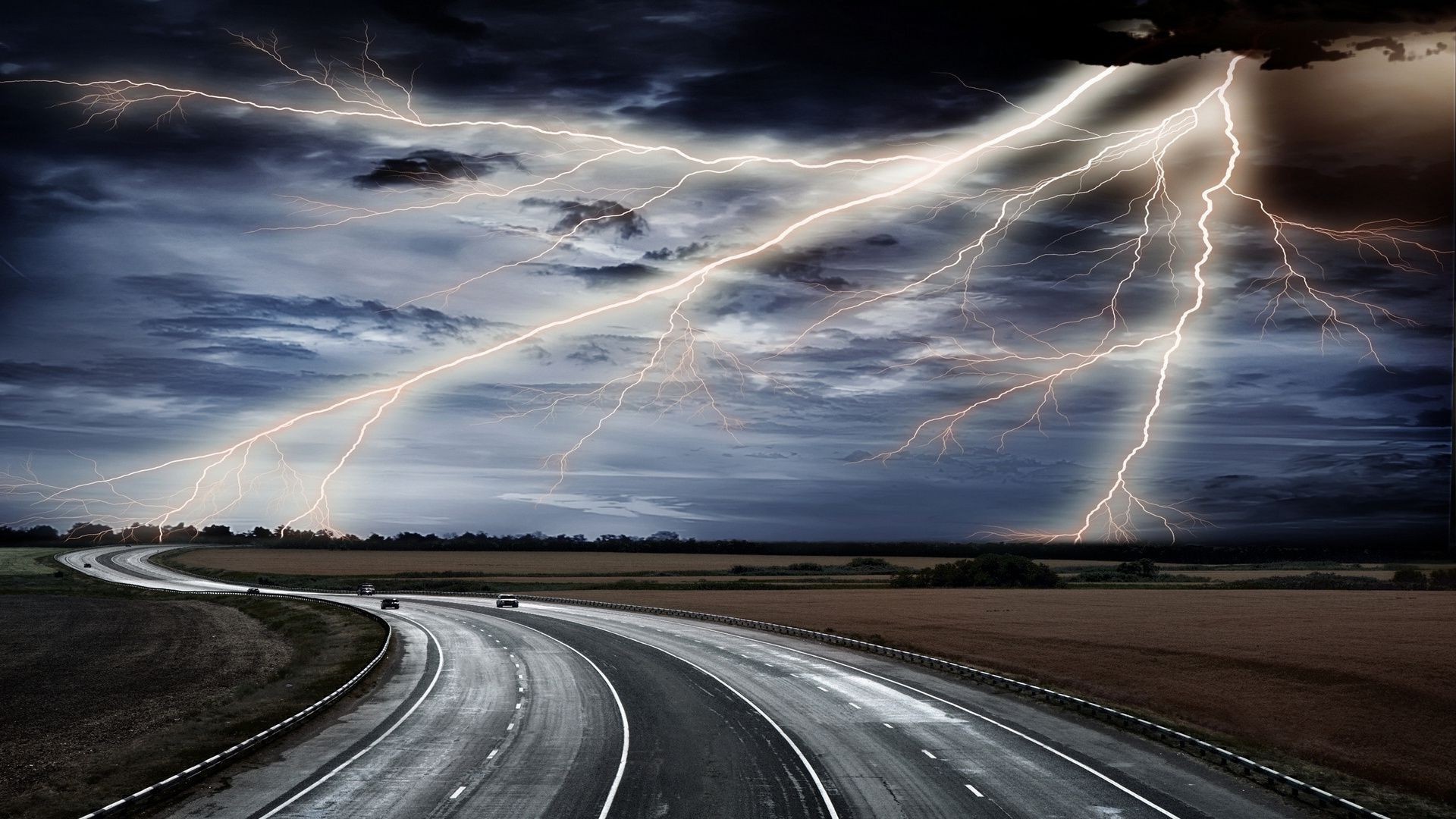 road storm highway dramatic asphalt sky thunderstorm fast travel landscape evening rain transportation system street long sunset dark light lightning