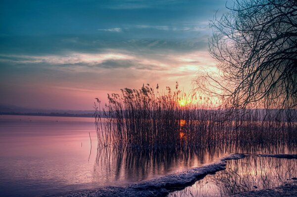 Landscape. Sunset and sunrise on the water