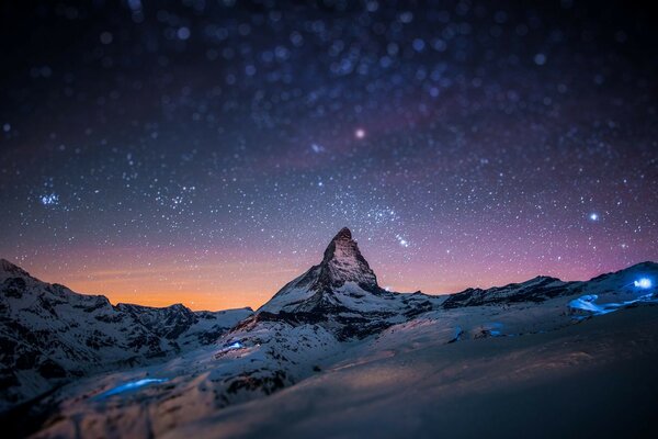 The starry sky above the rock