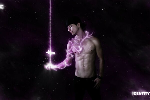 A young naked man holds a lightsaber