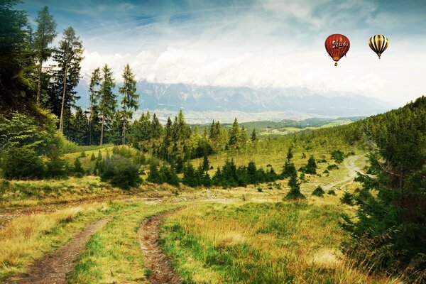 Hot air balloon trip, over the green plain