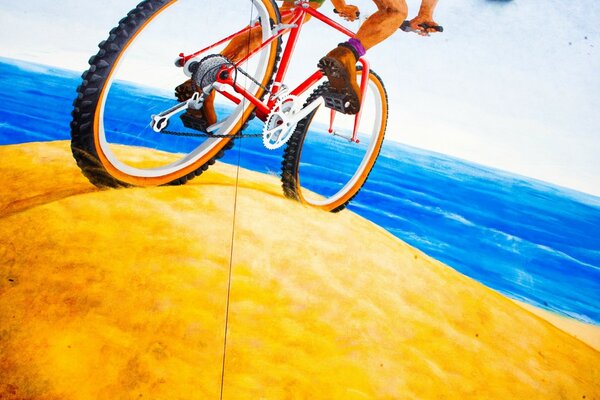 Balade à vélo sur les collines de sable à la mer