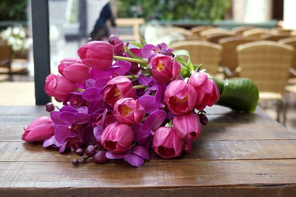 Romantic bouquet of tulips on the table