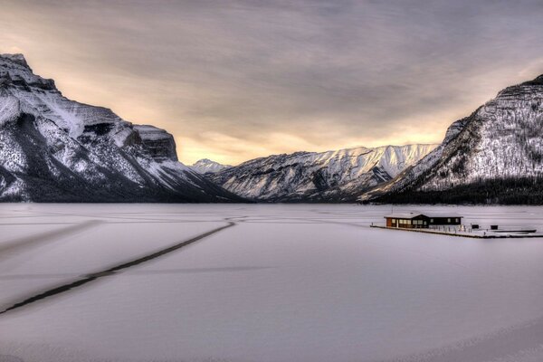 A lonely house in the snowy mountains