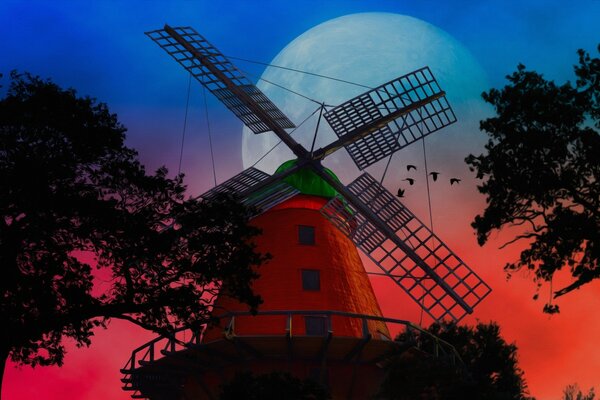 Windmill on the background of the evening sky