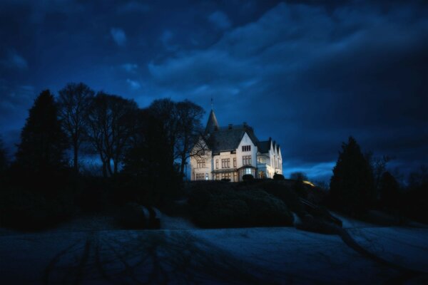 A big house in the evening twilight