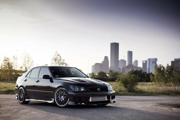 Sports car on the background of skyscrapers