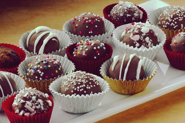 Chocolate cupcakes and cake with decoration