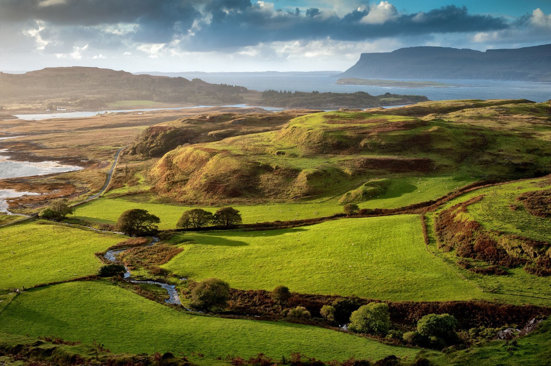 famous places landscape grass sheep water nature hill scenic outdoors countryside grassland valley hayfield field cropland agriculture travel river sky farm