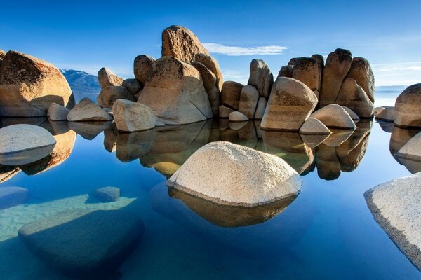 Landscape with huge boulders in the water