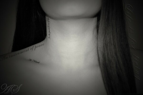 Inscriptions on the neck of a young girl